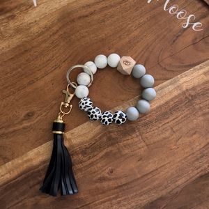 Marble and cow print silicone bead keychain with tassel and evil eye wooden bead